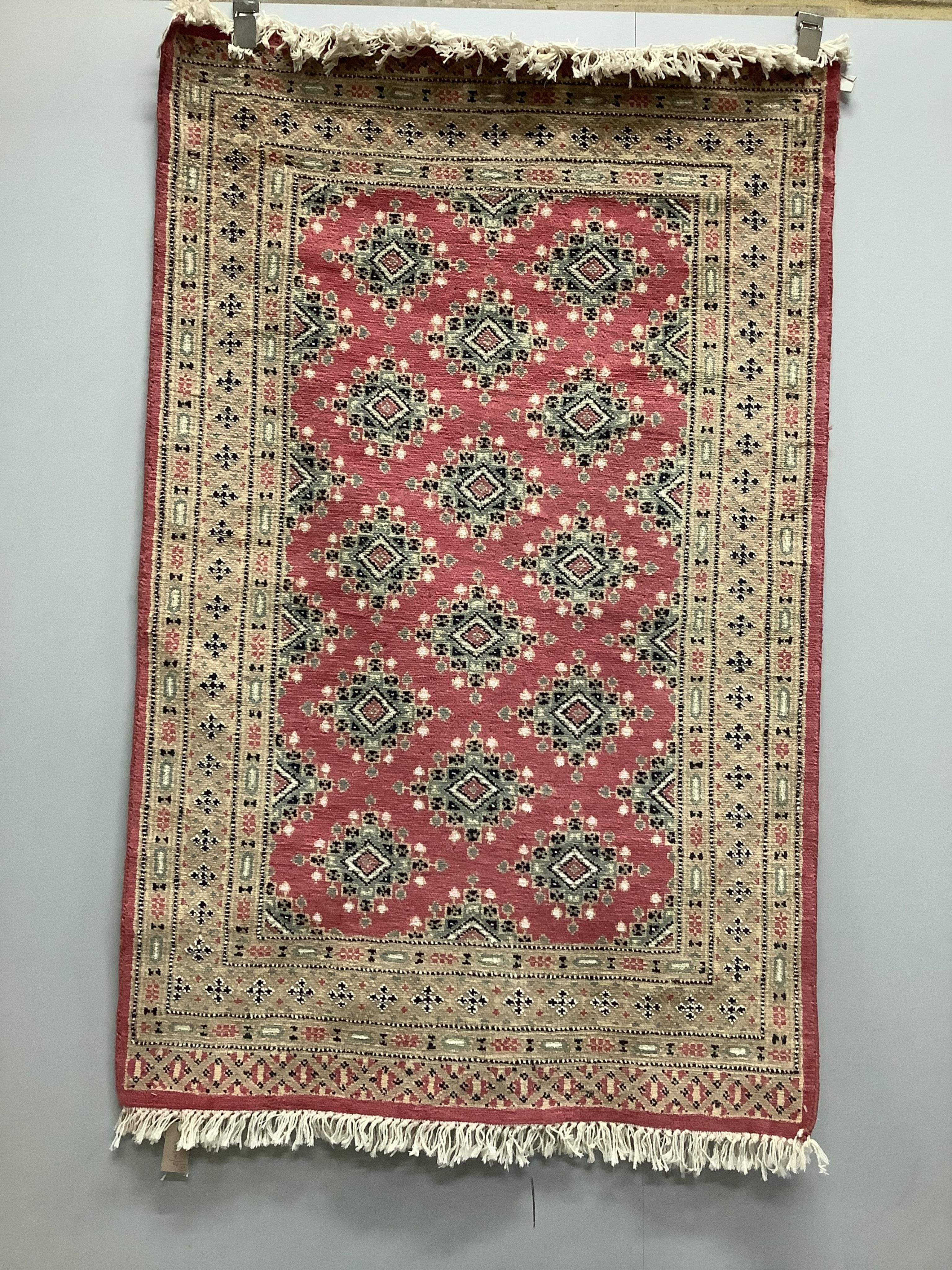 A Hamadan red ground rug, 150 x 108cm together with a North West Persian style rug and an Afghan runner. Condition - fair